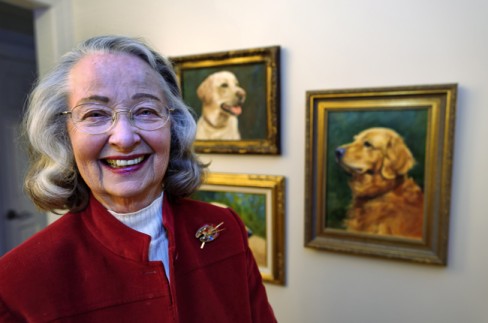 Nancy Hamilton with portraits that she had painted of their pets. Photo originally taken for the April/May 2011 Bloom feature on the Hamiltons. Photo by Steve Raymer