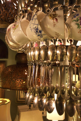A chandelier of cups and dinnerware. Photo by Jim Krause