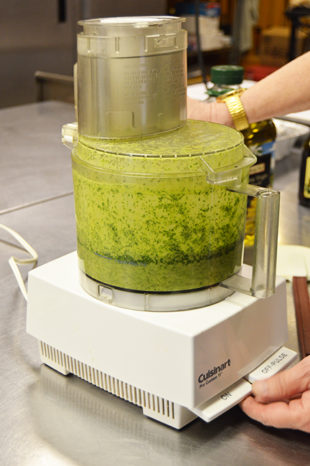 Davenport uses a food processor to combine the sauce. Photo by Erin Stephenson 