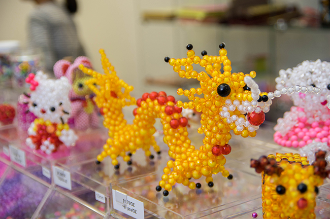 Beadwork characters. Photo by Darryl Smith.