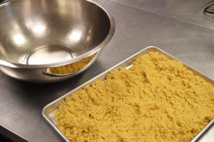 The cooked quinoa and metal mixing bowl. Photo by Erin Stephenson