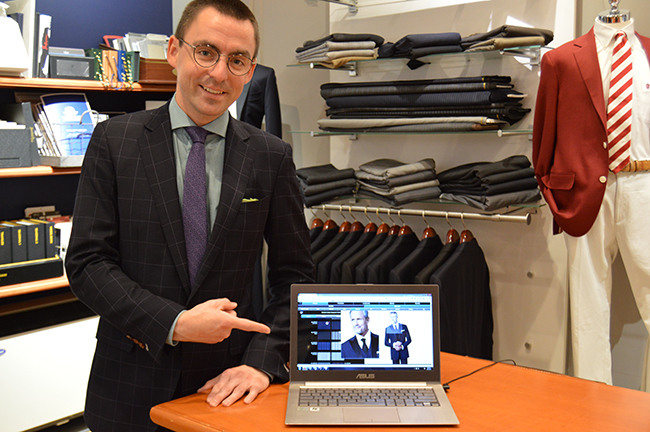 Retail Sales Associate John C. Porter demonstrates the ADesign software. Photo by Erin Stephenson