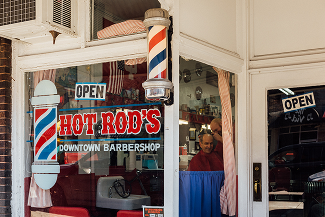 The old-fashioned red, white, and blue barber pole outside Hot Rod’s. Photo by Stephen Sproull