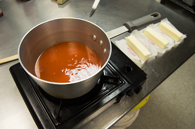 Preparing the sauce. Photo by Erin Stephenson