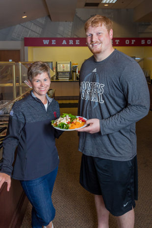 Amy Freel and Jacob Bailey at Indiana University Athletics’ Training Table. Photo by James Kellar