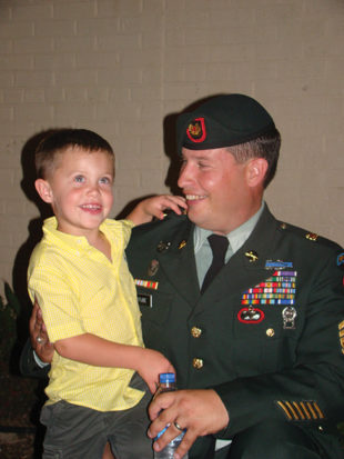 Stube with his son, Greg Jr., then age 4. Courtesy photo