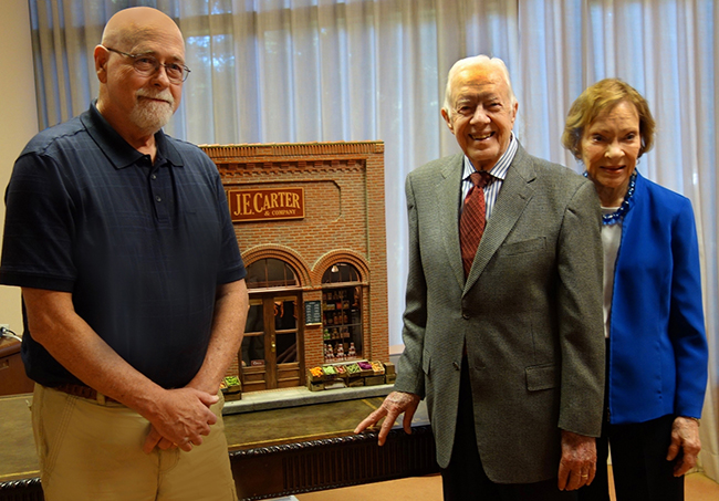  Artist Thomas Norpell (left) with former President Jimmy Carter and Mrs. Rosalynn Carter during the presentation of the replica at the Carter Center in Atlanta. Courtesy photo
