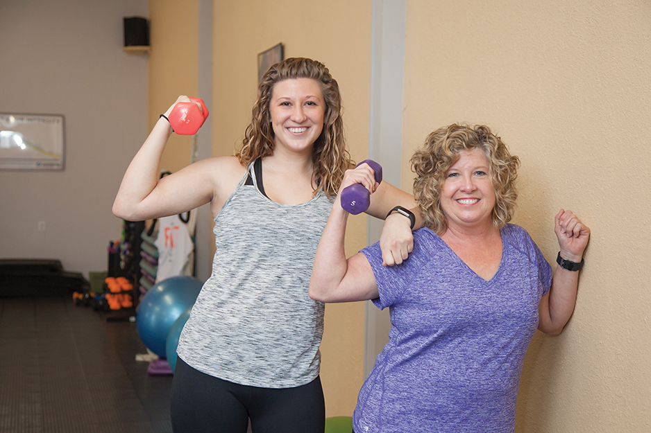 Daughter Ali and mother Paula Burt working out together at Jazzercise Bloomington. Photo by M. Elizabeth Hershey