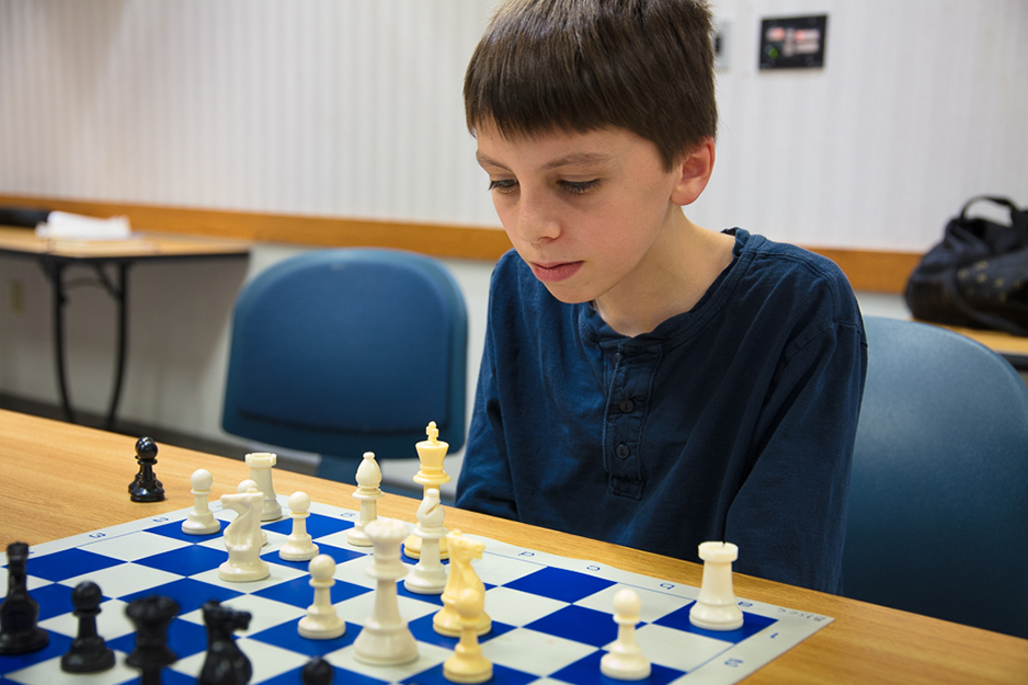 Nate Abdullah studies the board. Photo by James Kellar