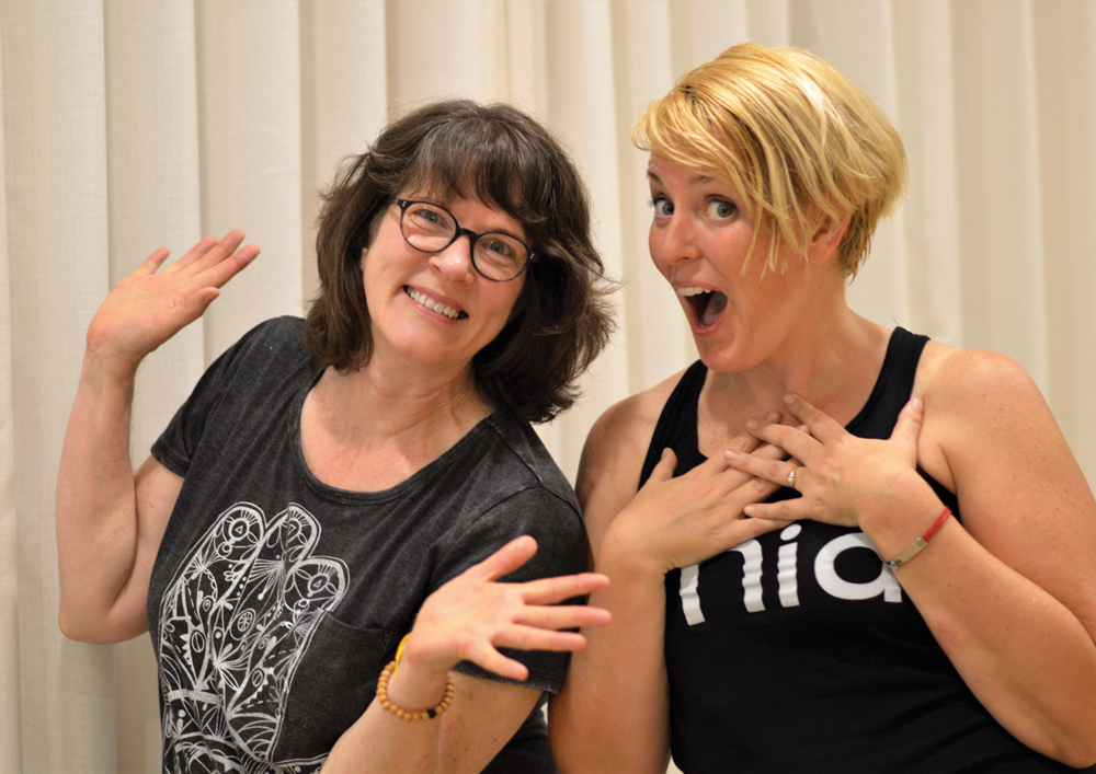 The post-class smiling faces of the author and Williams. Photo by Jaime Sweany