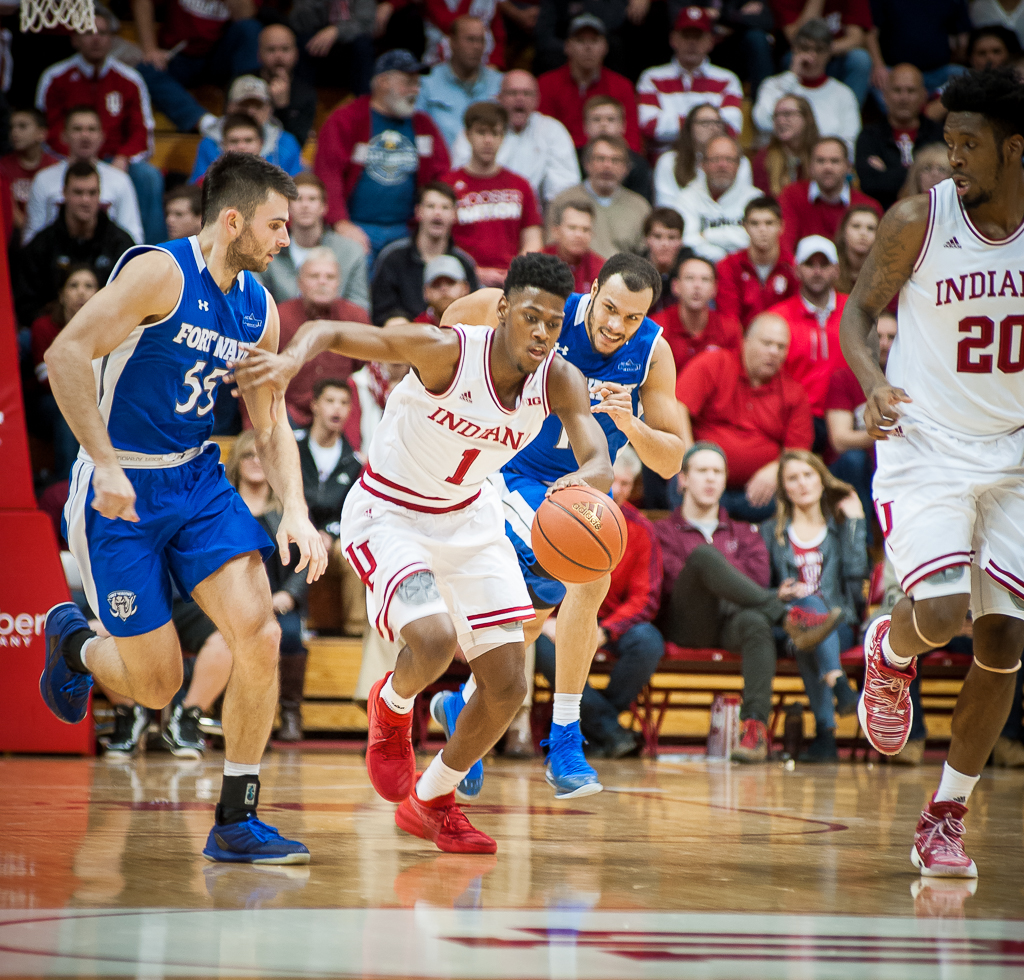 IU's Aljami Durham, 1, drives the ball up-court against Fort Wayne's John Konchar, 55, in the first half of the Hoosiers' 92-72 loss to the Mastodons. Photo by Rodney Margison