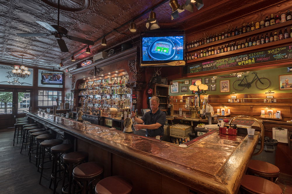 Kevin "Coach" Kochery has tended The Crazy Horse bar for 25 years. Photos by James Kellar