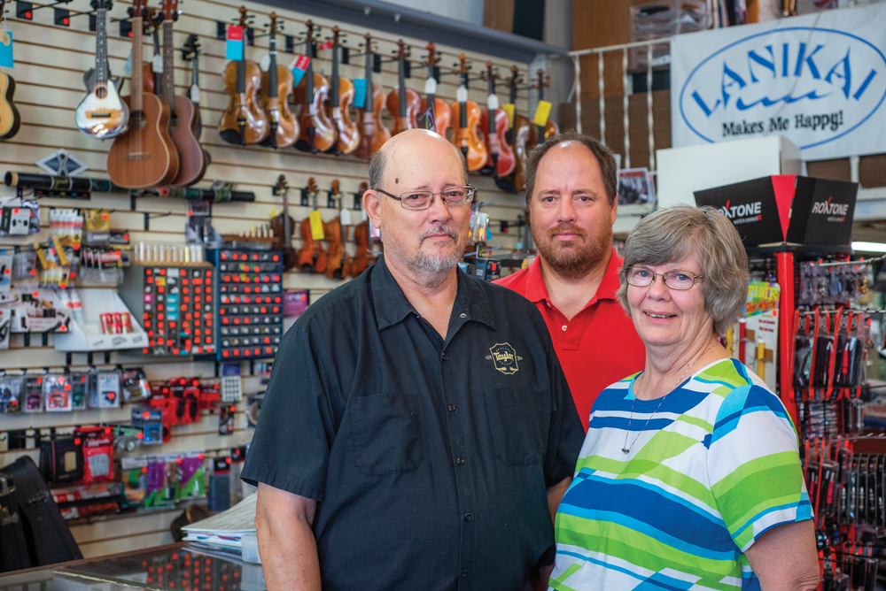 Phil, Eric, and Linda Gause. Photo by Rodney Margison