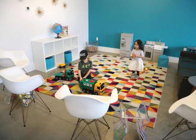 Luca, 7, and Mila, 3, Sotamayor enjoy the children’s play area at Feta. 