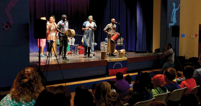 Betsayda Machado y La Parranda el Clavo perform at Fairview Elementary School in a Lotus Blossoms Outreach program in September 2017. Photo by Merrell Hatlen 