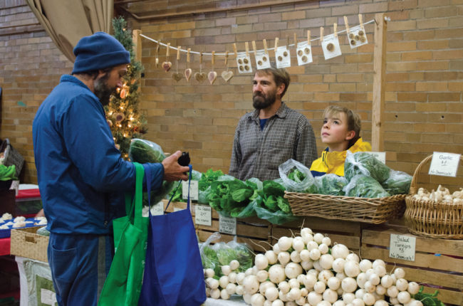 A typical Saturday at the Bloomington Winter Farmers' Market features vendors such as Earth Song Farm. Photos by Mike Waddell