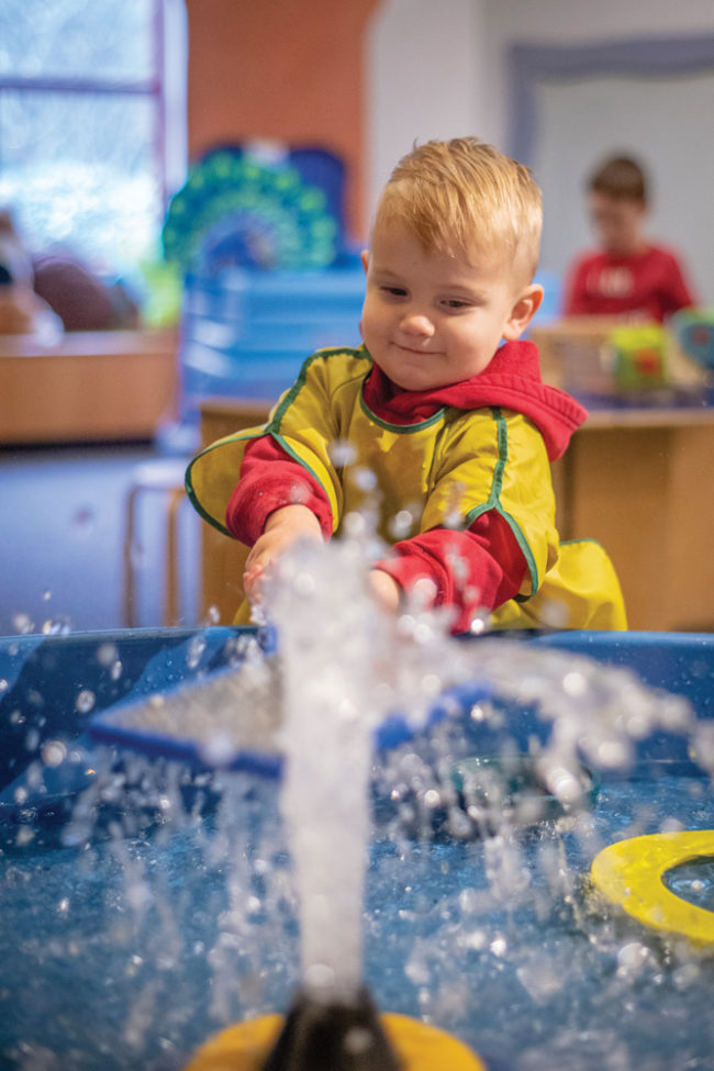 Chandler Pursell, 2, Bloomington, playing at a variety of interactive exhibits at WonderLab.