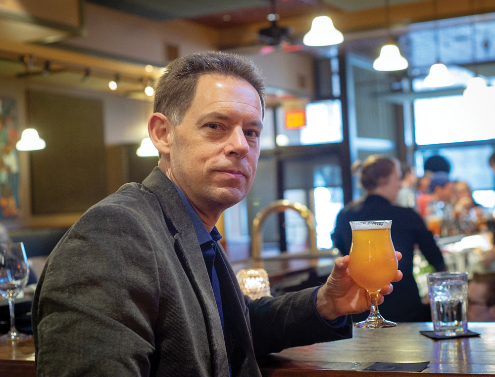 Enjoying a La Fin du Monde at The Uptown Cafe. Photo by Rodney Margison