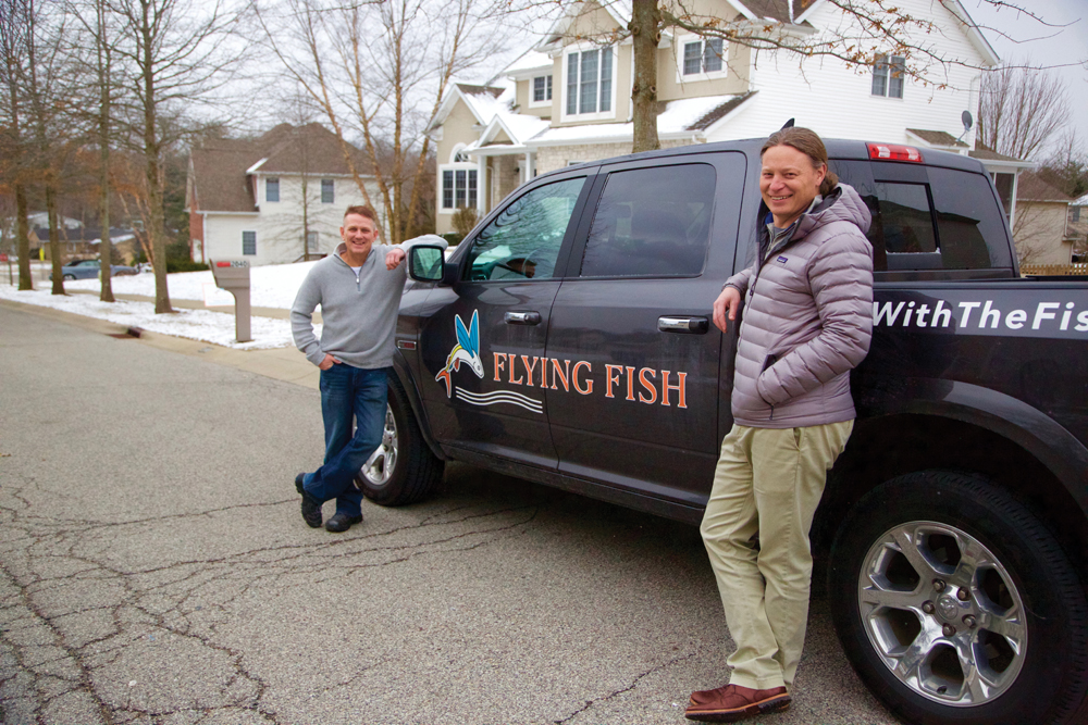 Jamie Donahue with Flying Fish owner Chris Clark. Photos by Jim Krause