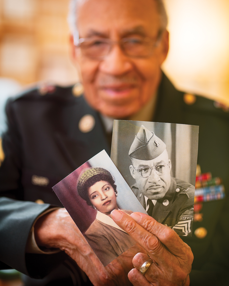 Gene holds photos of his first wife, Doris, and himself, back in the day.