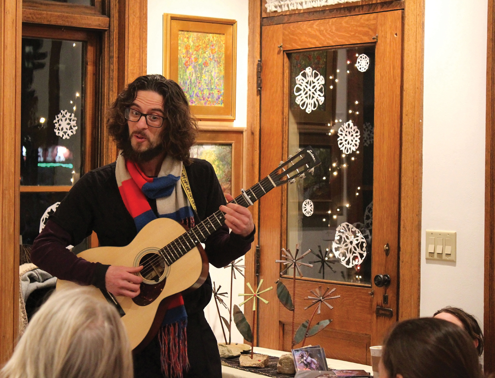 Travis Puntarelli performs at The Venue Fine Art & Gifts in January. Photo by Nicole McPheeters