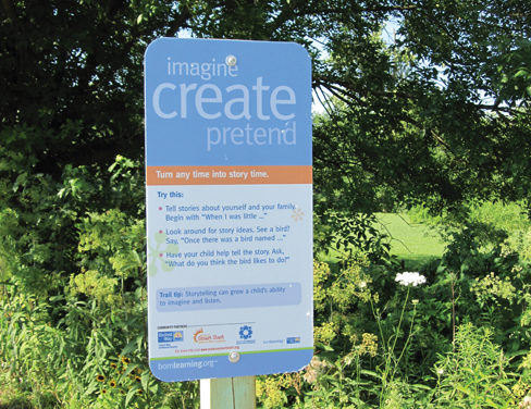 Signs on Clear Creek Trail Help Young Kids Develop