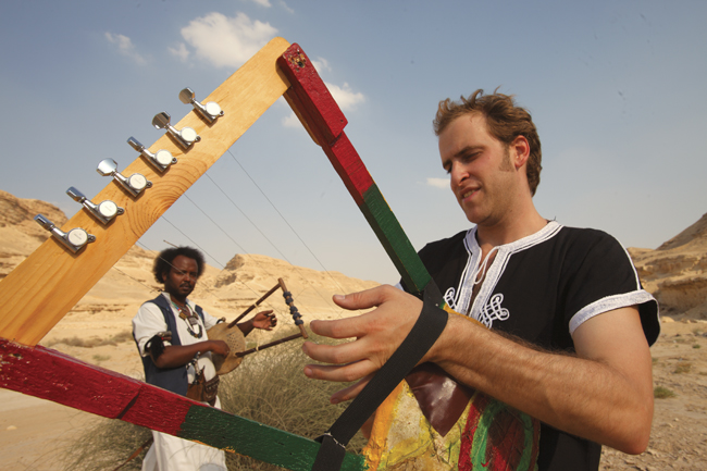 B-town Musician Making Music on Ancient African Instrument