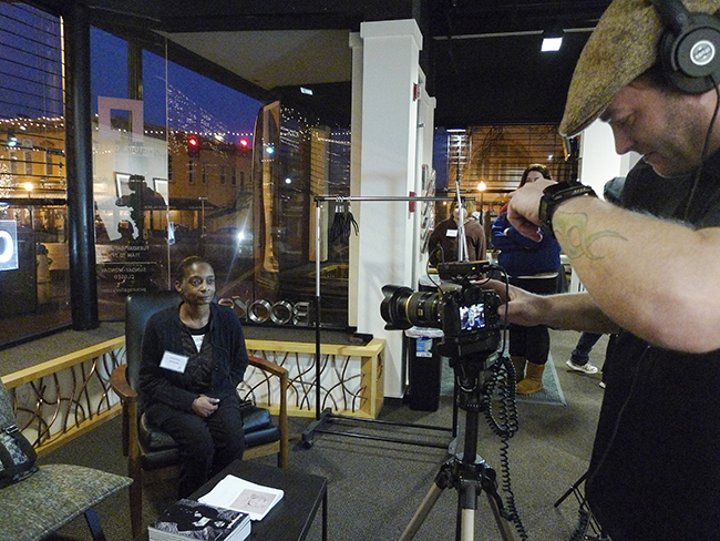 Darryl Smith videotapes Amelia Dixon, one of the project's participants. Photo by Chaz Mottinger