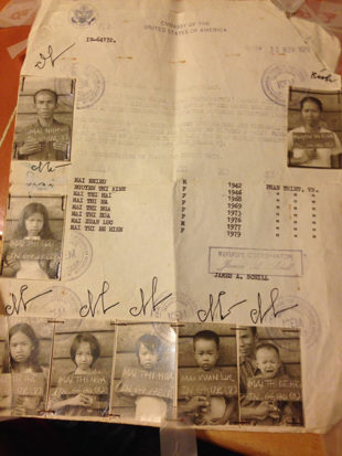 Immigration documents from 1981 when Jennifer and her family arrived in America; young Jennifer is the child in the middle row. Photo by Stephen Sproull