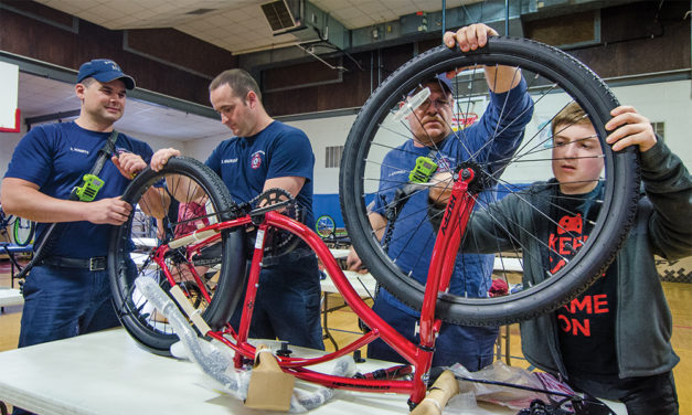 Kids Assemble Their New Bikes at Boys & Girls Clubs of B-town