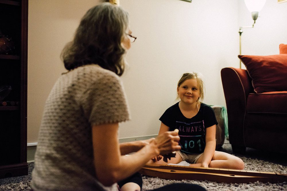 Gloria Stearns-Bruner works with a young client. Photo by Stephen Sproull