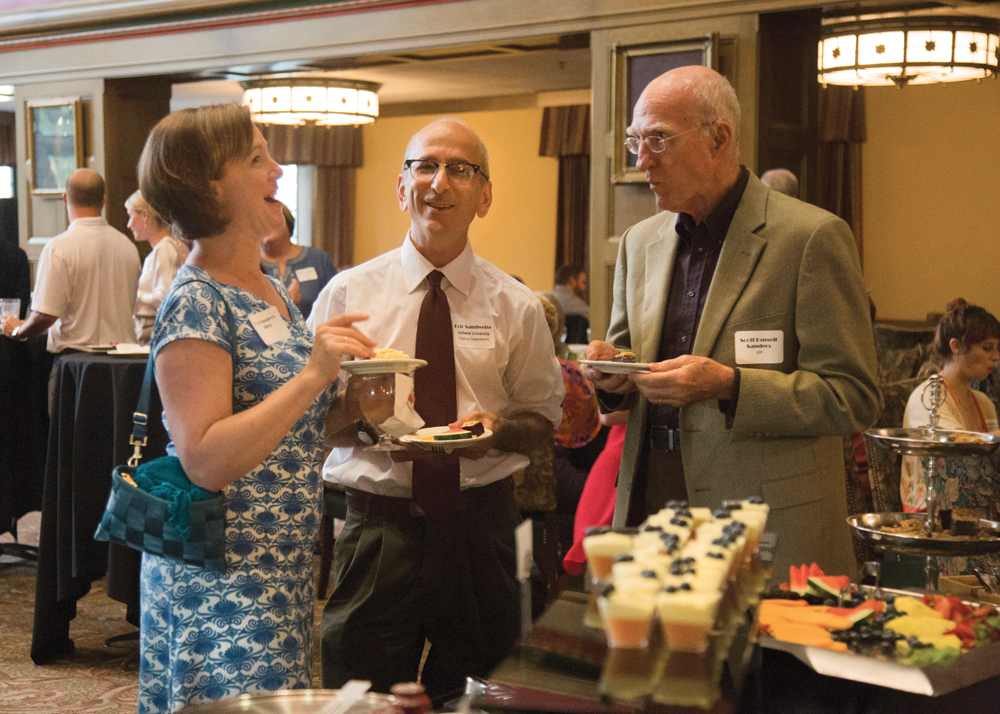 Eric Sandweiss, chair of the IU History Department (center), chats with (l-r) Eva Allen, assistant director of the IU Environmental Resilience Institute, and author Scott Russell Sanders.