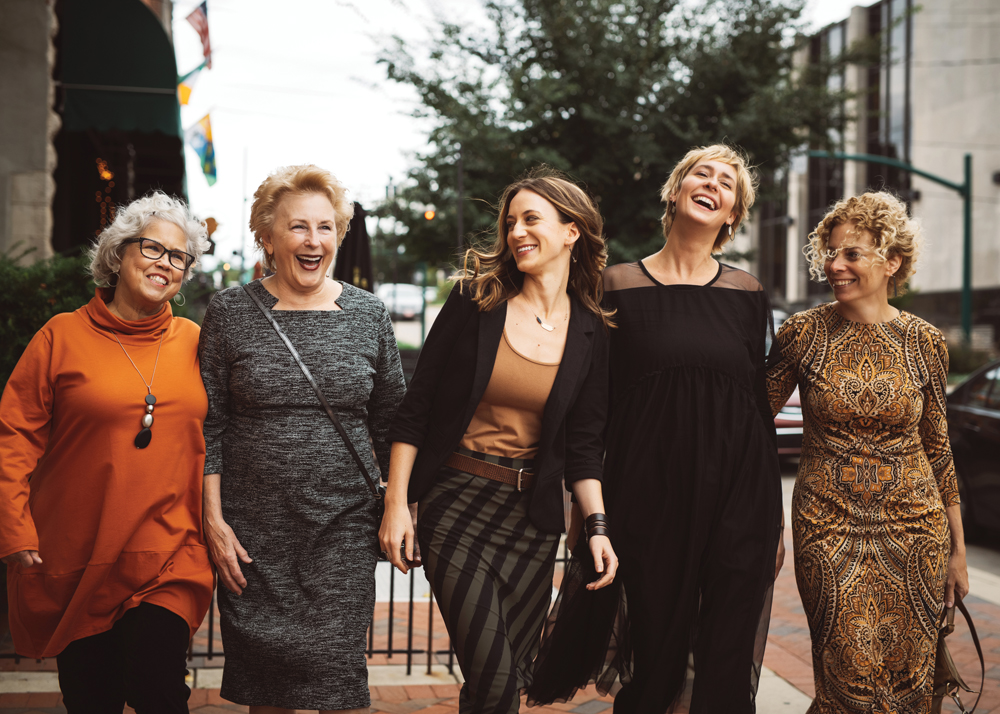 A moment of Mirth: Diane Harrison West in a Just Jill tunic and corduroy leggings from XCVI, Barbara Weiskopf in a Maggie London tweed dress, Mirth co-owner Amanda Forgas in a Survival boyfriend blazer and M Rena tank top with a Porto striped skirt, Mirth co-owner Kelly Jennings in a black mesh dress by Alembika, and Samantha Eibling in a paisley dress by London Times.