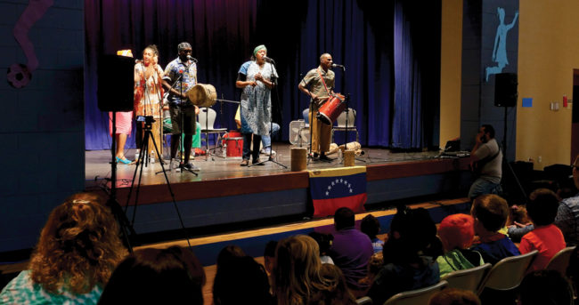 Betsayda Machado y La Parranda el Clavo perform at Fairview Elementary School in a Lotus Blossoms Outreach program in September 2017. Photo by Merrell Hatlen