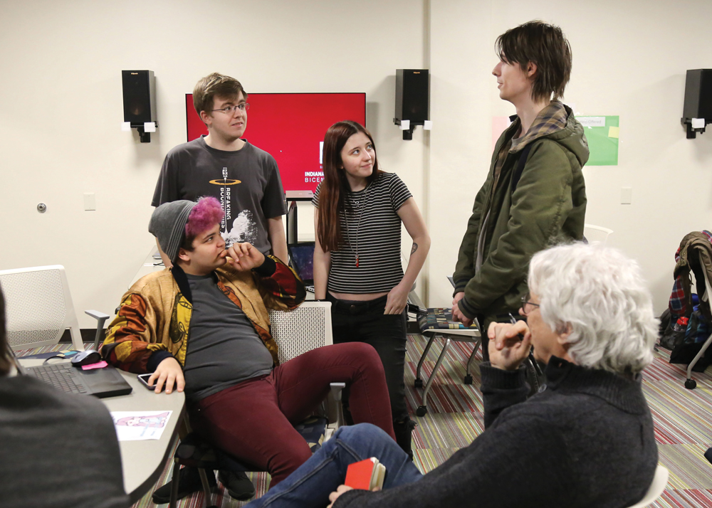IU students discuss the upcoming release of a student-made video game presented at Game Night with Bloom contributor Peter Dorfman. Photo by Naama Levy